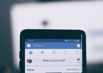 A photo of facebook page opened in an Android smartphone showing new Facebook page experience update