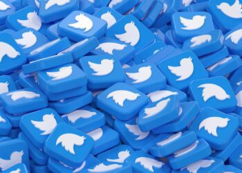 A 3d render of Twitter icons showing a large number of Tweets
