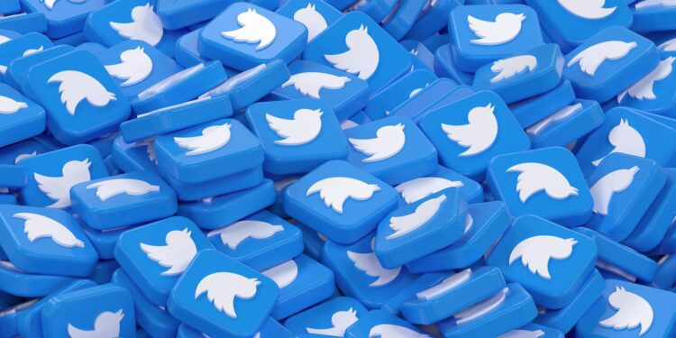 A 3d render of Twitter icons showing a large number of Tweets