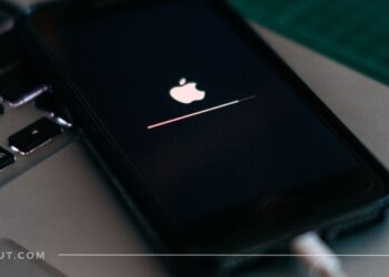 An iPhone getting Apple logo on a black screen while it's being updated