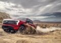 A photo of Ford F150 Lightning truck in red
