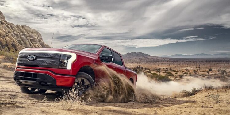 A photo of Ford F150 Lightning truck in red